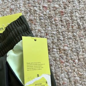 All in Motion Men’s 7” Run shorts olive green.